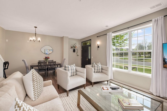 17208 72nd Ave N, Maple Grove, MN 55311 - living area with wood finished floors and a chandelier