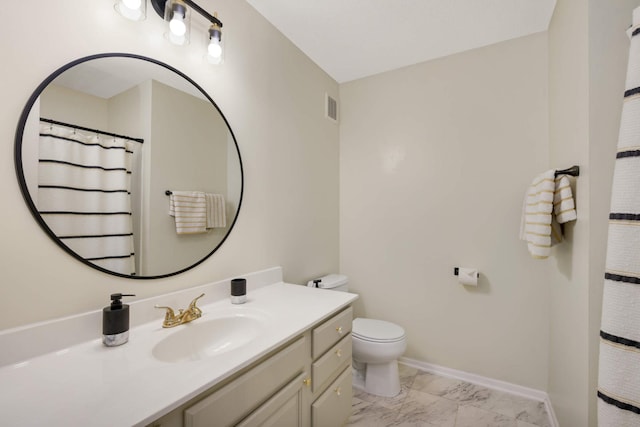 17208 72nd Ave N, Maple Grove, MN 55311 - bathroom with marble look tile flooring, vanity, toilet, and baseboards
