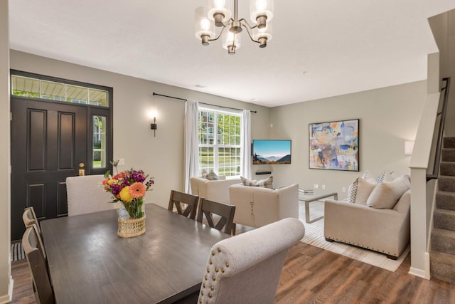 17208 72nd Ave N, Maple Grove, MN 55311 - dining space featuring a chandelier, wood finished floors, stairway, and baseboards