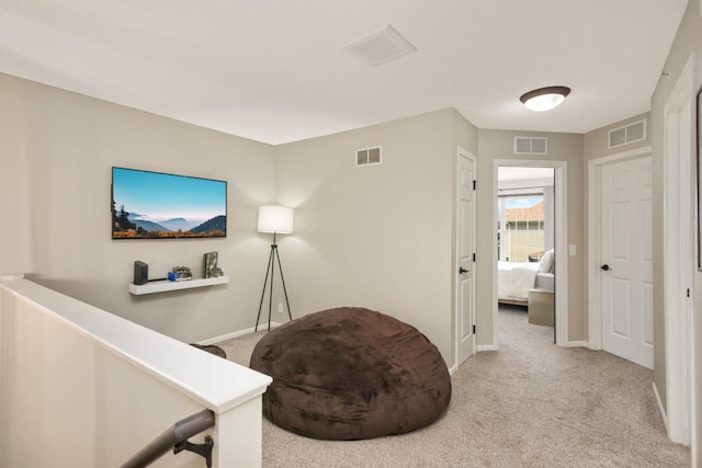 17208 72nd Ave N, Maple Grove, MN 55311 - sitting room with carpet flooring, an upstairs landing, and baseboards