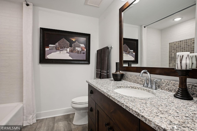 13708 Park Haven Trl, Prior Lake, MN 55372 - full bathroom featuring wood finished floors, toilet, baseboards, vanity, and shower / bath combination with curtain