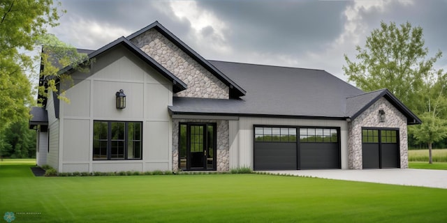 7854 Dogwood Dr, Horace, ND 58047 - view of front of house with stone siding, a garage, a front lawn, and concrete driveway