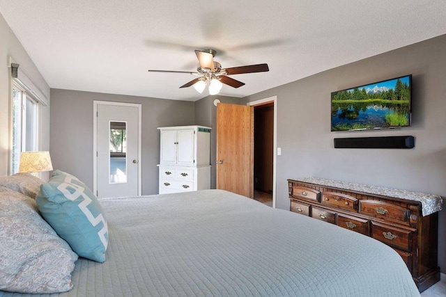 bedroom featuring ceiling fan