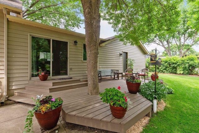 deck featuring a yard