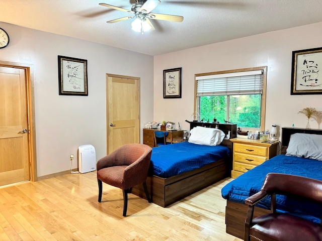 766 County Road F E, Vadnais Heights, MN 55127 - bedroom featuring light wood-type flooring and ceiling fan