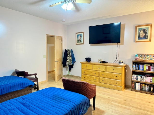 766 County Road F E, Vadnais Heights, MN 55127 - bedroom featuring light wood finished floors, ceiling fan, and baseboards