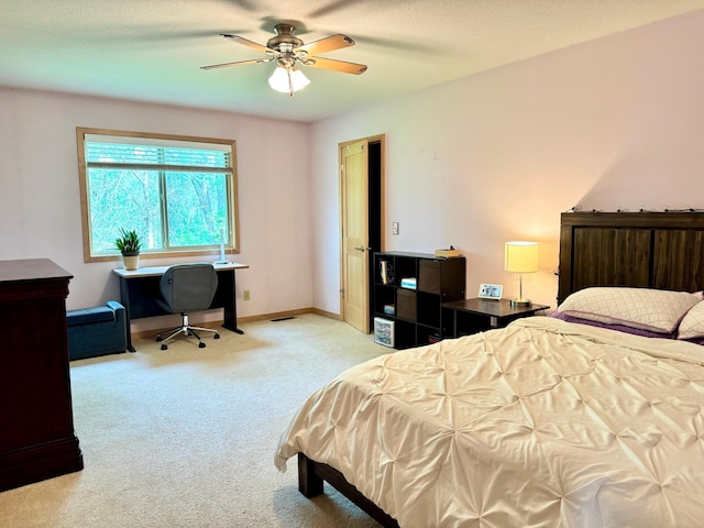 766 County Road F E, Vadnais Heights, MN 55127 - bedroom featuring carpet floors, an office area, baseboards, and a ceiling fan