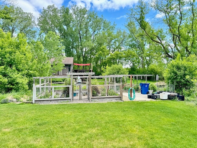 766 County Road F E, Vadnais Heights, MN 55127 - view of green lawn with a garden