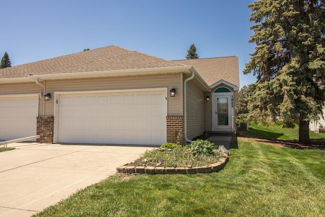 1922 Eastridge Ct, Stillwater, MN 55082 - view of front of property featuring brick siding, an attached garage, and concrete driveway