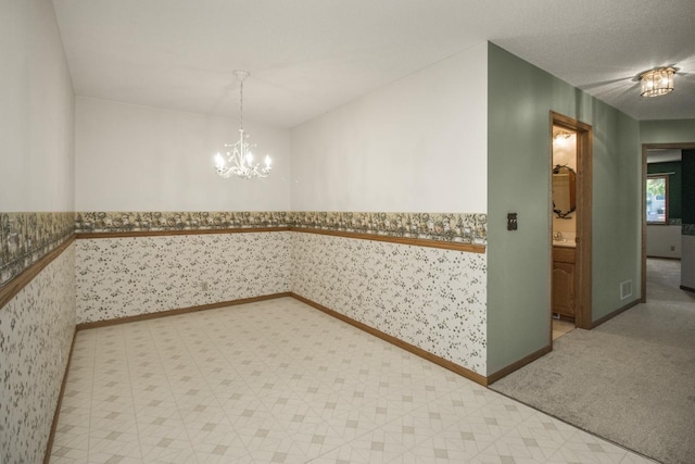 1922 Eastridge Ct, Stillwater, MN 55082 - unfurnished dining area featuring a chandelier, wallpapered walls, wainscoting, and baseboards