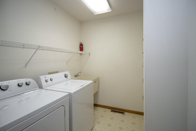 1922 Eastridge Ct, Stillwater, MN 55082 - laundry area with separate washer and dryer, light floors, and baseboards