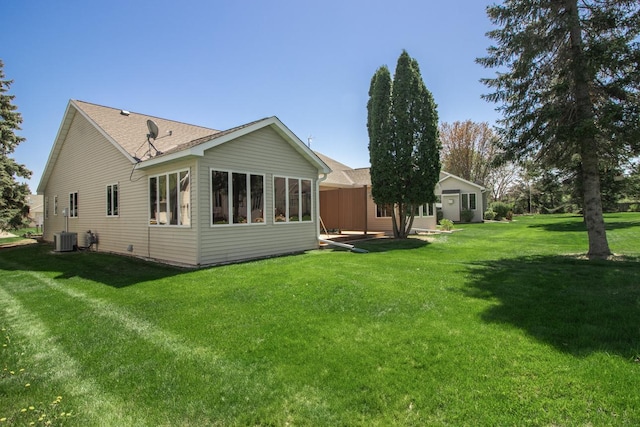1922 Eastridge Ct, Stillwater, MN 55082 - rear view of property featuring a yard and central AC