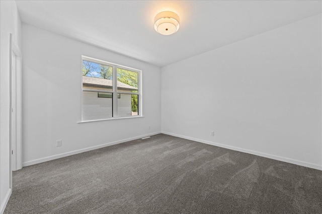 3822 Northern Ave, Spring Park, MN 55384 - empty room with dark carpet and baseboards