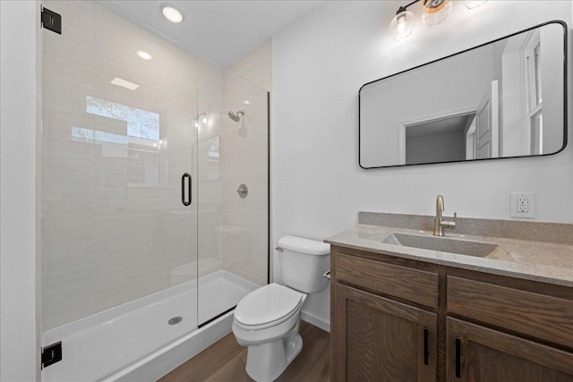 3822 Northern Ave, Spring Park, MN 55384 - full bath with wood finished floors, toilet, a shower stall, and vanity