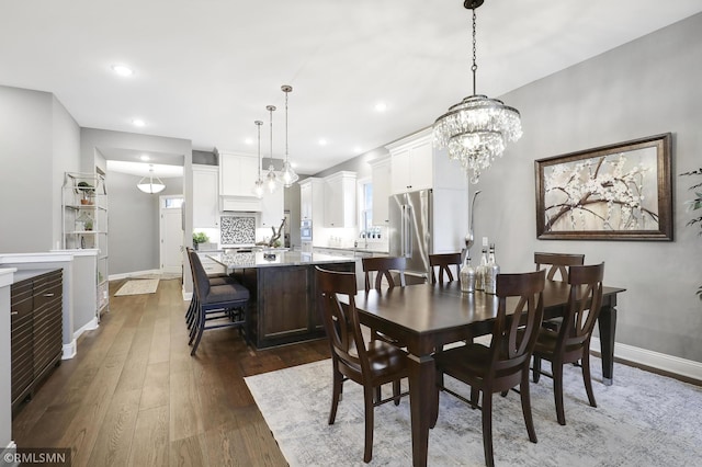 13714 Park Haven Trl NE, Prior Lake, MN 55372 - dining room featuring dark wood-style floors, baseboards, a chandelier, and recessed lighting