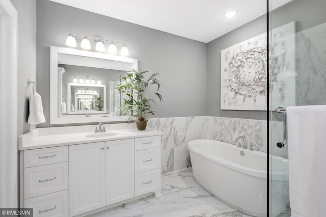 13714 Park Haven Trl NE, Prior Lake, MN 55372 - full bath with marble tiled flooring, a freestanding bath, vanity, and recessed lighting