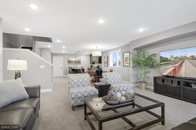 13714 Park Haven Trl NE, Prior Lake, MN 55372 - living room featuring recessed lighting, light colored carpet, baseboards, and stairway