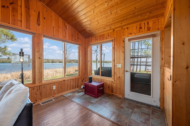 19490 Ruff Shores Rd, Harris Twp, MN 55744 - sunroom featuring vaulted ceiling and a water view