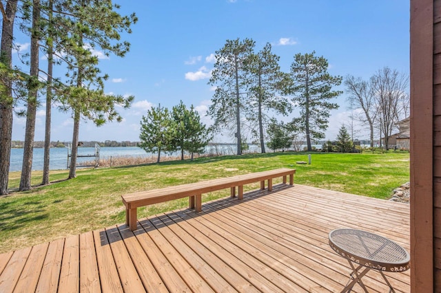 19490 Ruff Shores Rd, Harris Twp, MN 55744 - deck featuring a water view and a lawn