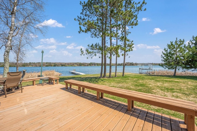 19490 Ruff Shores Rd, Harris Twp, MN 55744 - wooden terrace featuring a water view and a yard