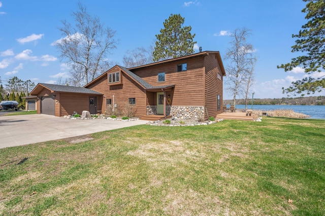 19490 Ruff Shores Rd, Harris Twp, MN 55744 - rustic home featuring a water view, a front lawn, a garage, concrete driveway, and stone siding