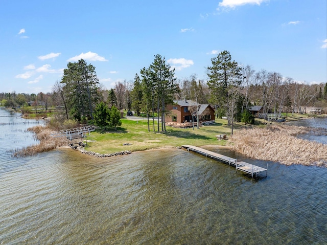 19490 Ruff Shores Rd, Harris Twp, MN 55744 - dock with a water view and a yard