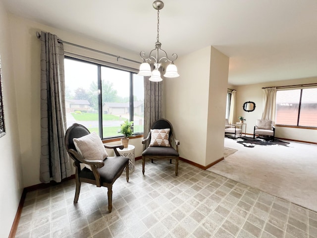 1950 Summit Ave, Worthington, MN 56187 - living area featuring light colored carpet, baseboards, and healthy amount of natural light
