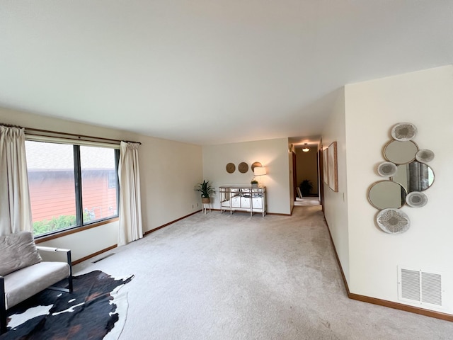 1950 Summit Ave, Worthington, MN 56187 - sitting room with light colored carpet and baseboards