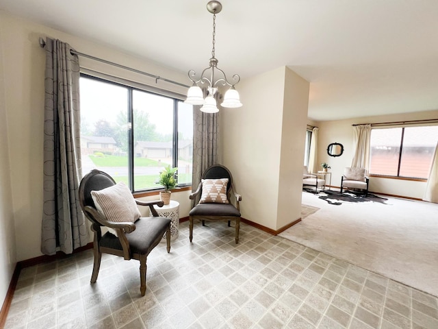 1950 Summit Ave, Worthington, MN 56187 - sitting room with light colored carpet, baseboards, and a chandelier