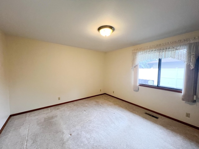 1950 Summit Ave, Worthington, MN 56187 - empty room with light carpet and baseboards