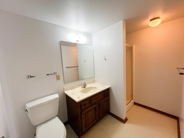 1950 Summit Ave, Worthington, MN 56187 - full bath with a stall shower, vanity, toilet, and a textured ceiling