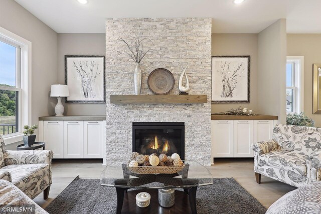 4104 Osprey Ct, Prior Lake, MN 55372 - living area with light wood finished floors, a fireplace, and recessed lighting