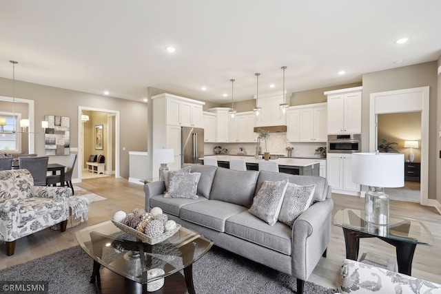 4104 Osprey Ct, Prior Lake, MN 55372 - living area with light wood-type flooring, recessed lighting, and baseboards