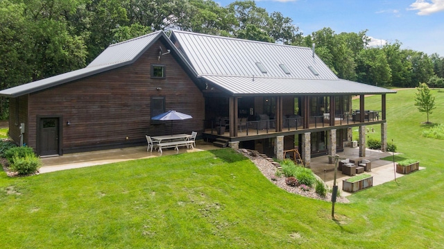 1701 Retreat Cir, Minnetrista, MN 55364 - back of house with a patio area, a lawn, outdoor lounge area, and a metal roof