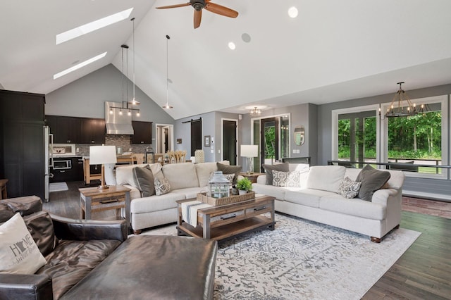 1701 Retreat Cir, Minnetrista, MN 55364 - living area with high vaulted ceiling, a ceiling fan, a skylight, dark wood-style flooring, and a chandelier