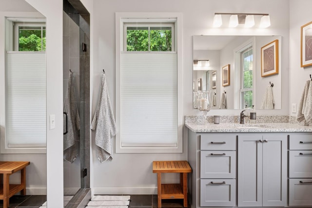 1701 Retreat Cir, Minnetrista, MN 55364 - full bath with vanity, plenty of natural light, and a shower stall