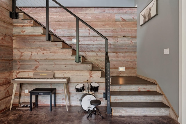 1701 Retreat Cir, Minnetrista, MN 55364 - staircase with concrete flooring and wood walls