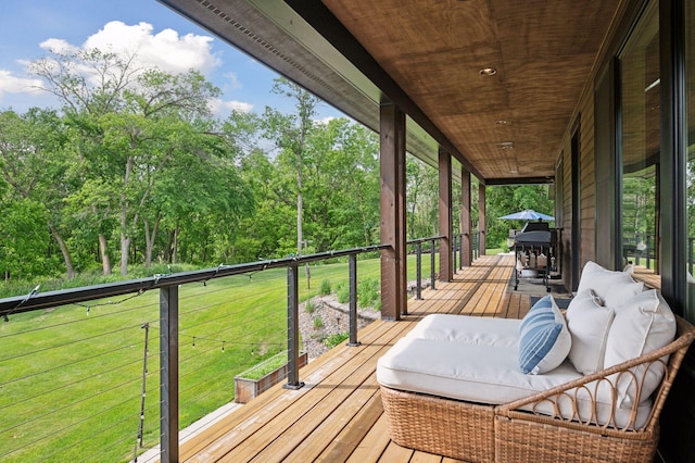 1701 Retreat Cir, Minnetrista, MN 55364 - deck featuring view of wooded area