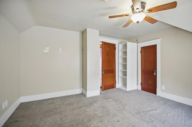 733 1st St SW, Faribault, MN 55021 - unfurnished bedroom featuring carpet floors, baseboards, a ceiling fan, and lofted ceiling