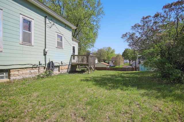 733 1st St SW, Faribault, MN 55021 - view of grassy yard featuring a wooden deck and stairs