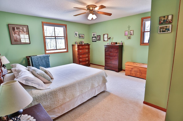 127 County Rd W, Pleasant Valley Twp, WI 54022 - bedroom featuring light carpet, a textured ceiling, ceiling fan, and baseboards