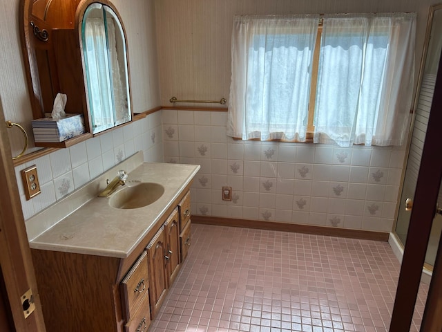 25622 Blue Bonnet Rd, Center Twp, MN 56465 - bathroom with healthy amount of natural light, vanity, and tile walls