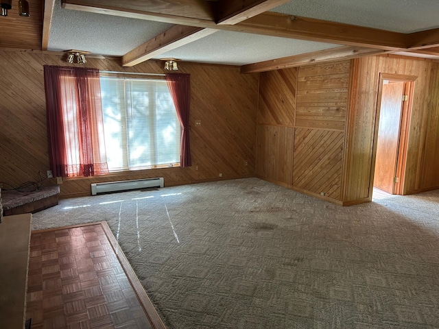 25622 Blue Bonnet Rd, Center Twp, MN 56465 - unfurnished living room featuring a baseboard radiator, beamed ceiling, wooden walls, and a textured ceiling