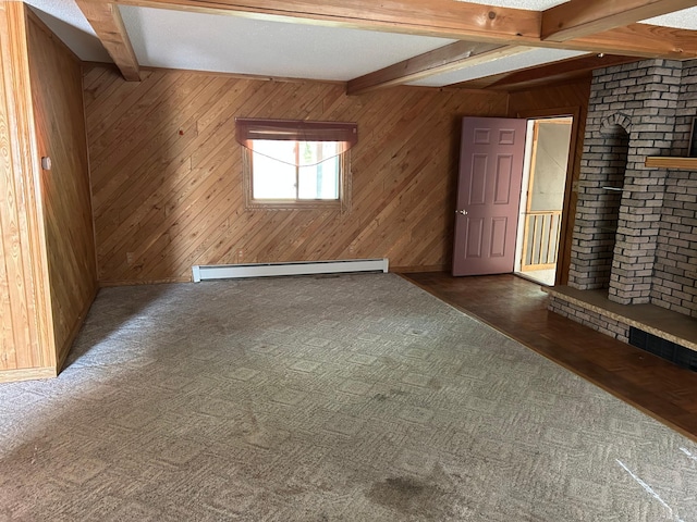 25622 Blue Bonnet Rd, Center Twp, MN 56465 - carpeted spare room with beamed ceiling, a baseboard radiator, wood walls, and baseboards