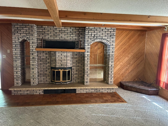 25622 Blue Bonnet Rd, Center Twp, MN 56465 - detailed view of beamed ceiling, a fireplace, and wood walls