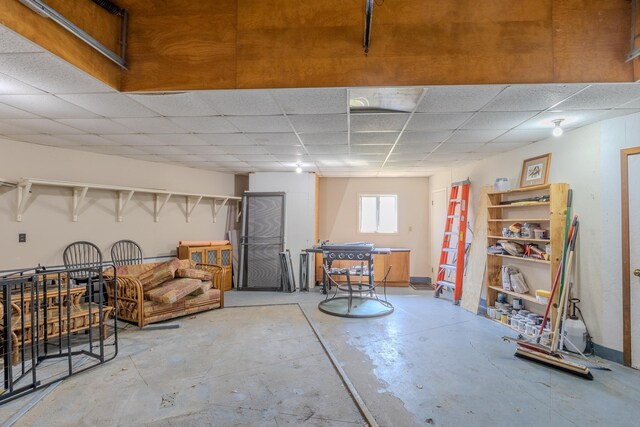 basement with a drop ceiling