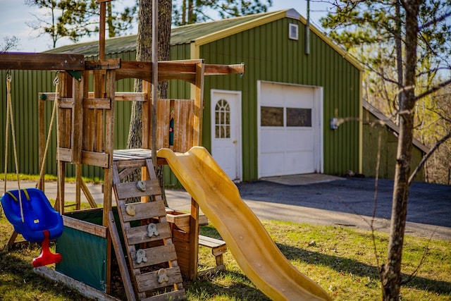 view of jungle gym with an outdoor structure