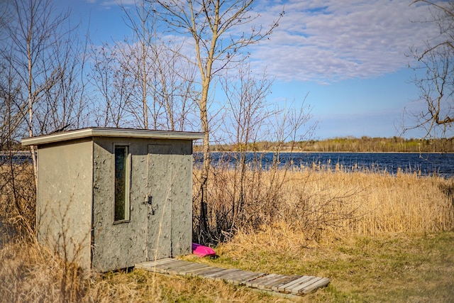 view of shed featuring a water view