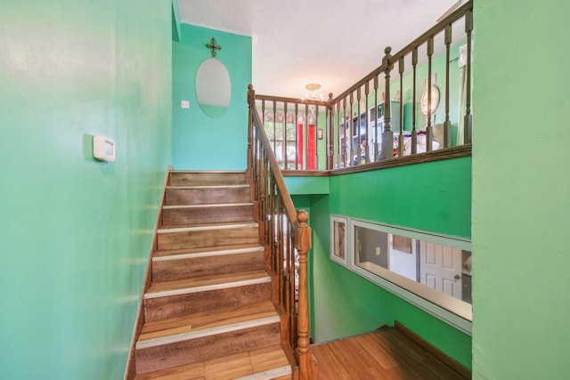 6522 Kilmer Ln N, Maple Grove, MN 55369 - stairway featuring wood finished floors