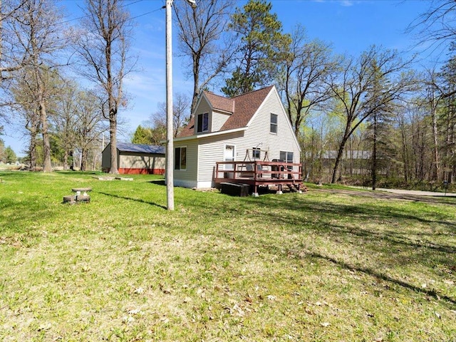 15921 Eaglewood Dr, Bay Lake Twp, MN 56444 - view of property exterior with a deck and a yard